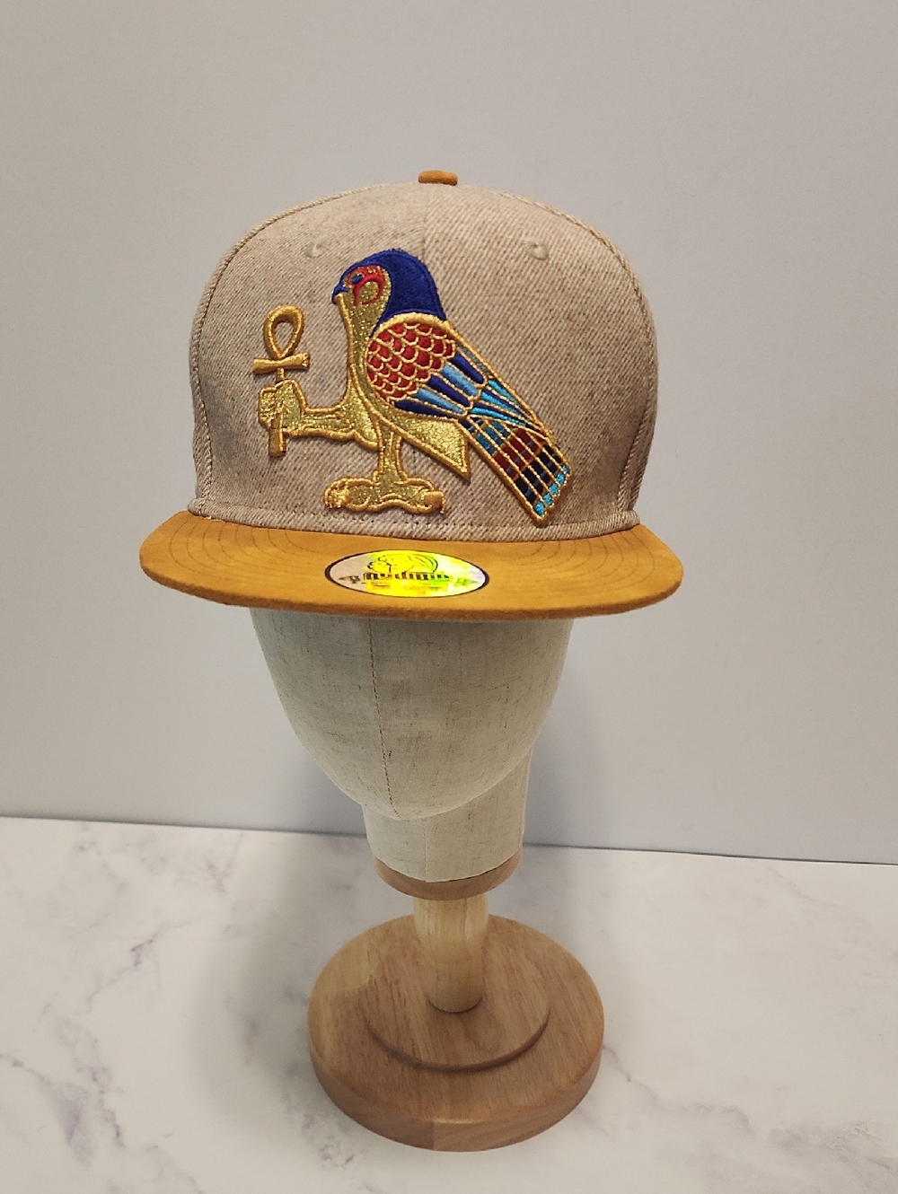 Nuwbia Apparel Dynasty Twentys Embroidered Bird Snapback Hat in Tan and Mustard